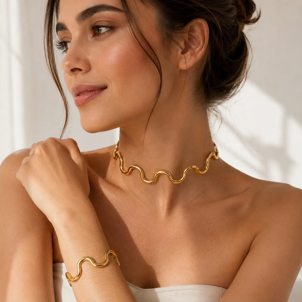 Conjunto de Collar y Brazalete Ondas Retro – Oro
