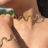 Conjunto de Collar y Brazalete Ondas Retro – Oro